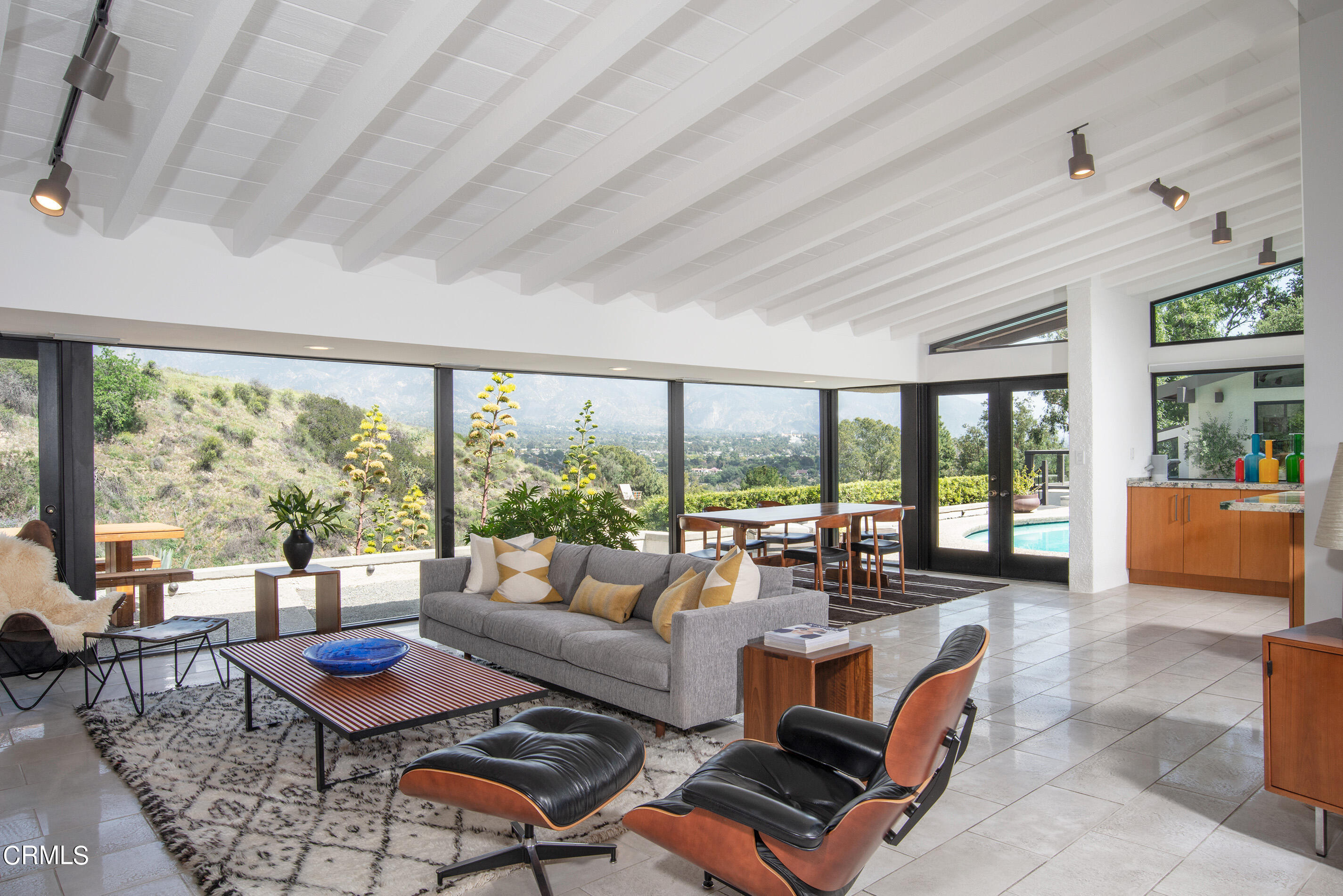 1255 Rancheros Road Pasadena, CA 91103 - Photo 4 of 10 a living room with furniture and a large window