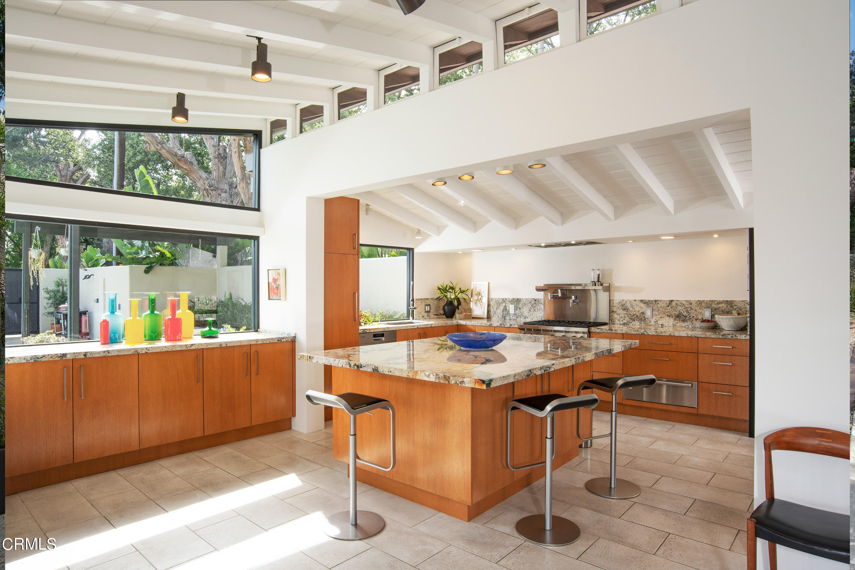 1255 Rancheros Road Pasadena, CA 91103 - Photo 5 of 10 a view of a dining room with furniture window and outside view