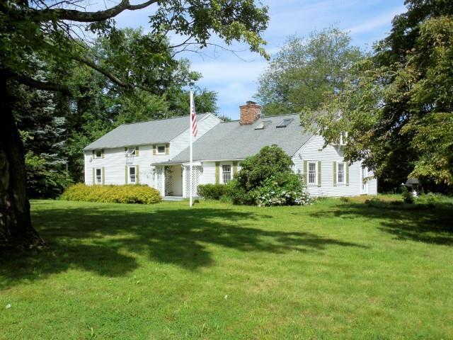 5 Washington Hill Road Newtown, CT 06470 - Photo 1 of 1 a front view of a house with a yard