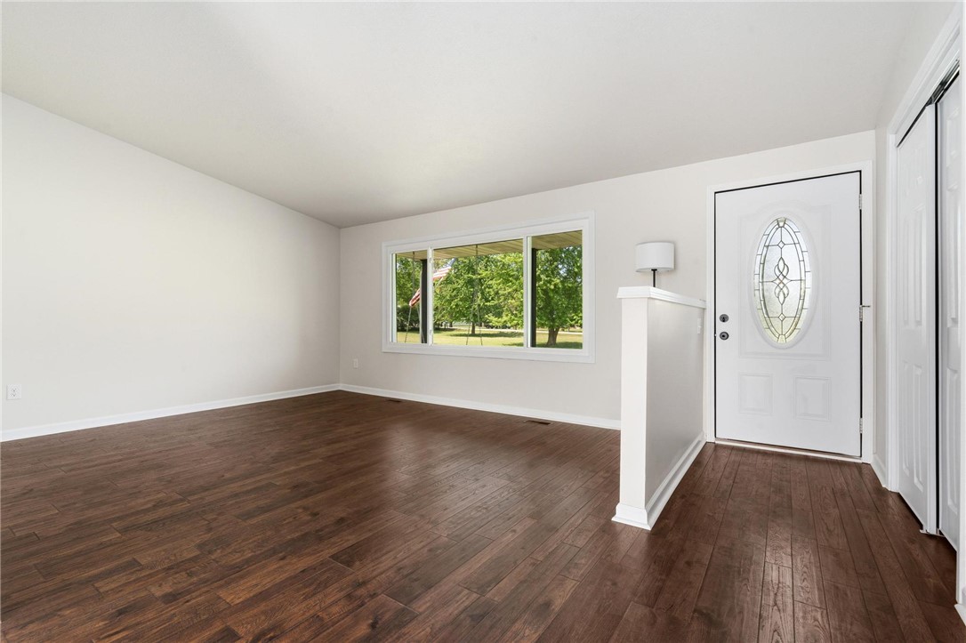 1353 Foust Road Xenia, OH 45385 - Photo 26 of 50 This inviting living space features gleaming hardwood floors and ample natural light, perfect for everyday living.