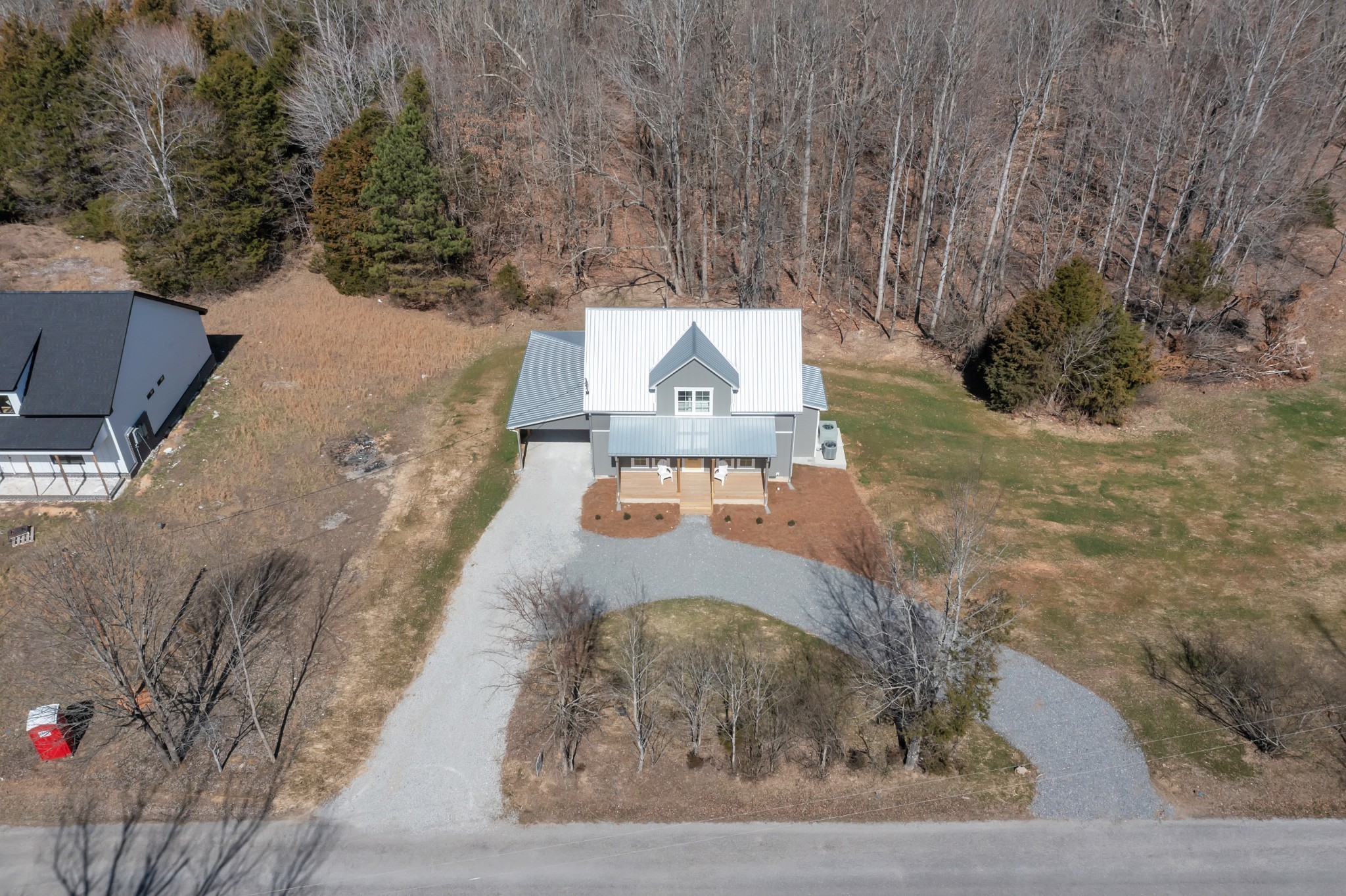 555 Ghea Road Normandy, TN 37360 - Photo 11 of 43 a view of a house with a yard