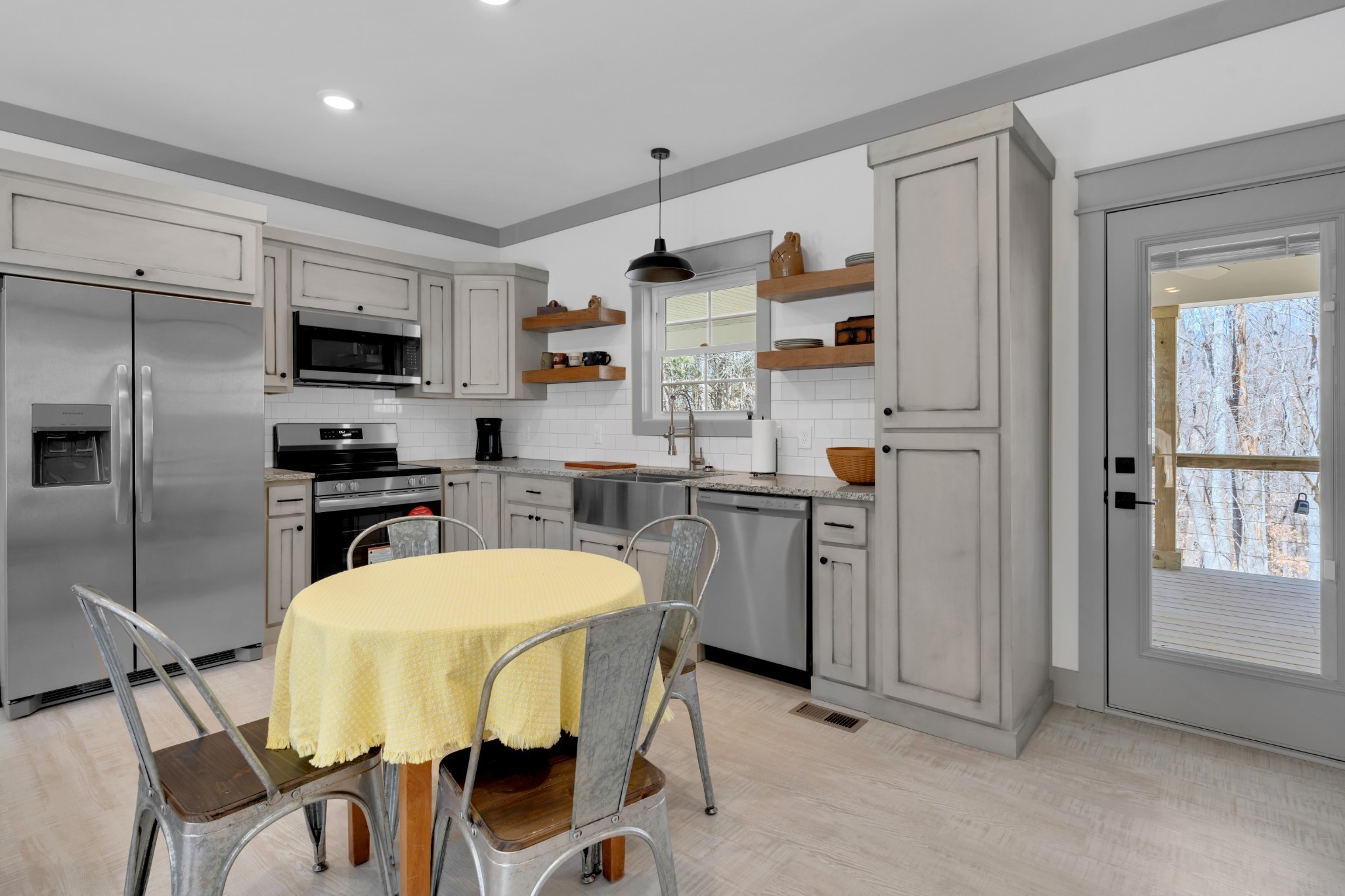 555 Ghea Road Normandy, TN 37360 - Photo 25 of 43 a kitchen with refrigerator and cabinets