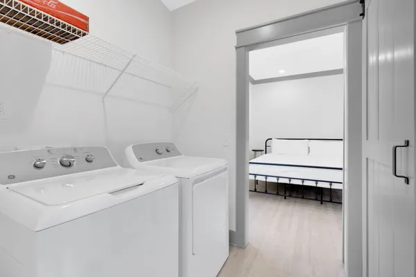 a utility room with dryer and washer