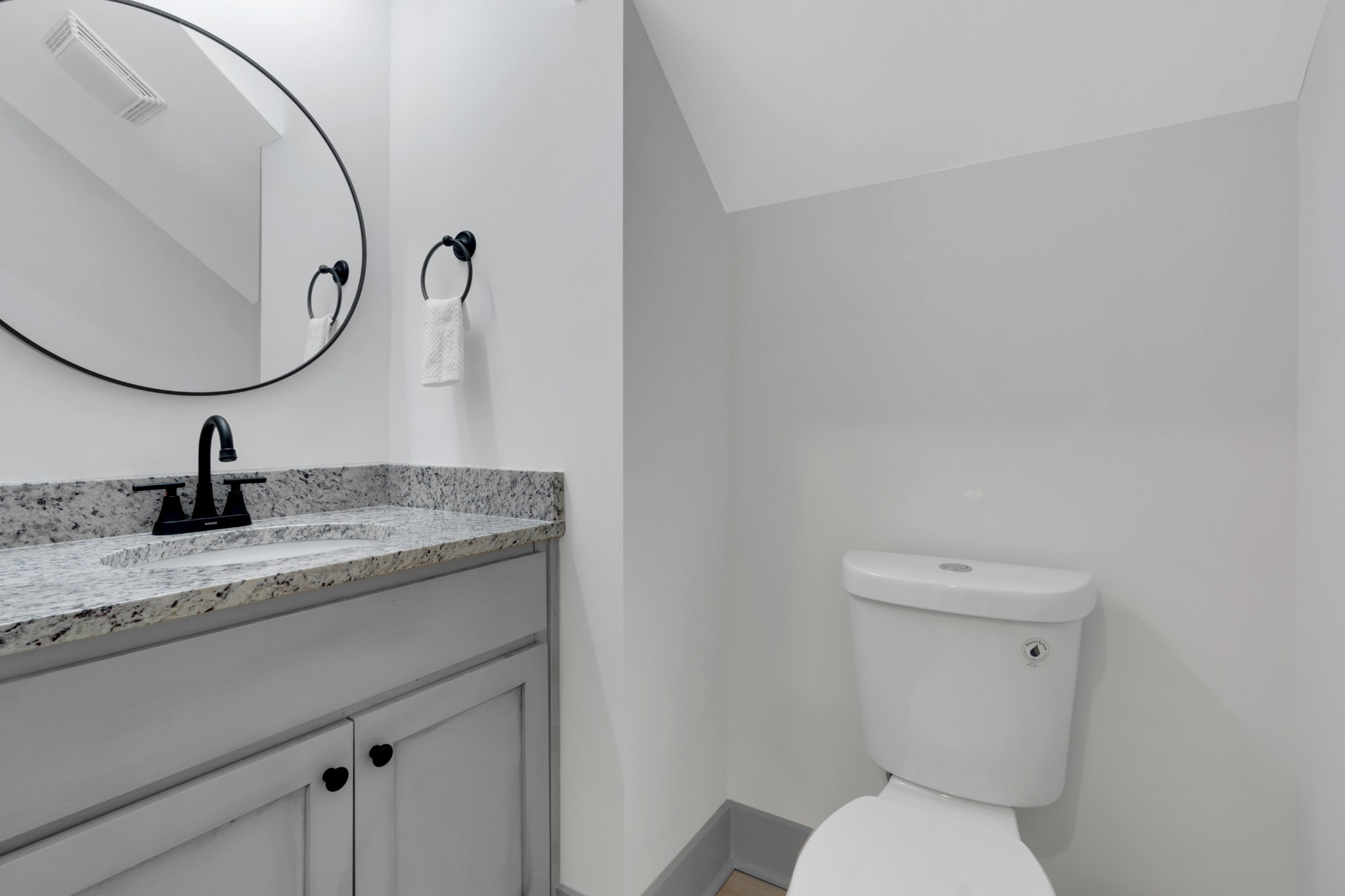 555 Ghea Road Normandy, TN 37360 - Photo 30 of 43 a bathroom with a granite countertop toilet sink and mirror