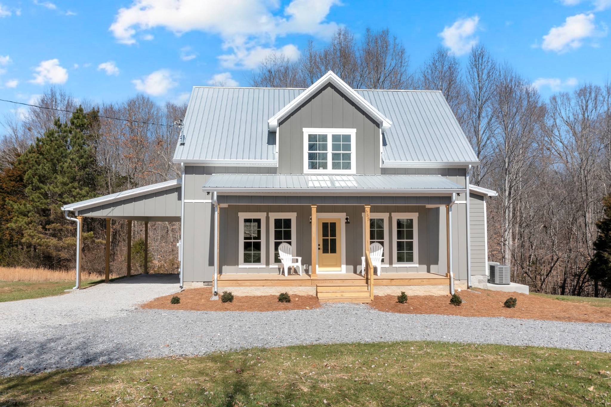 555 Ghea Road Normandy, TN 37360 - Photo 4 of 43 a front view of a house with swimming pool