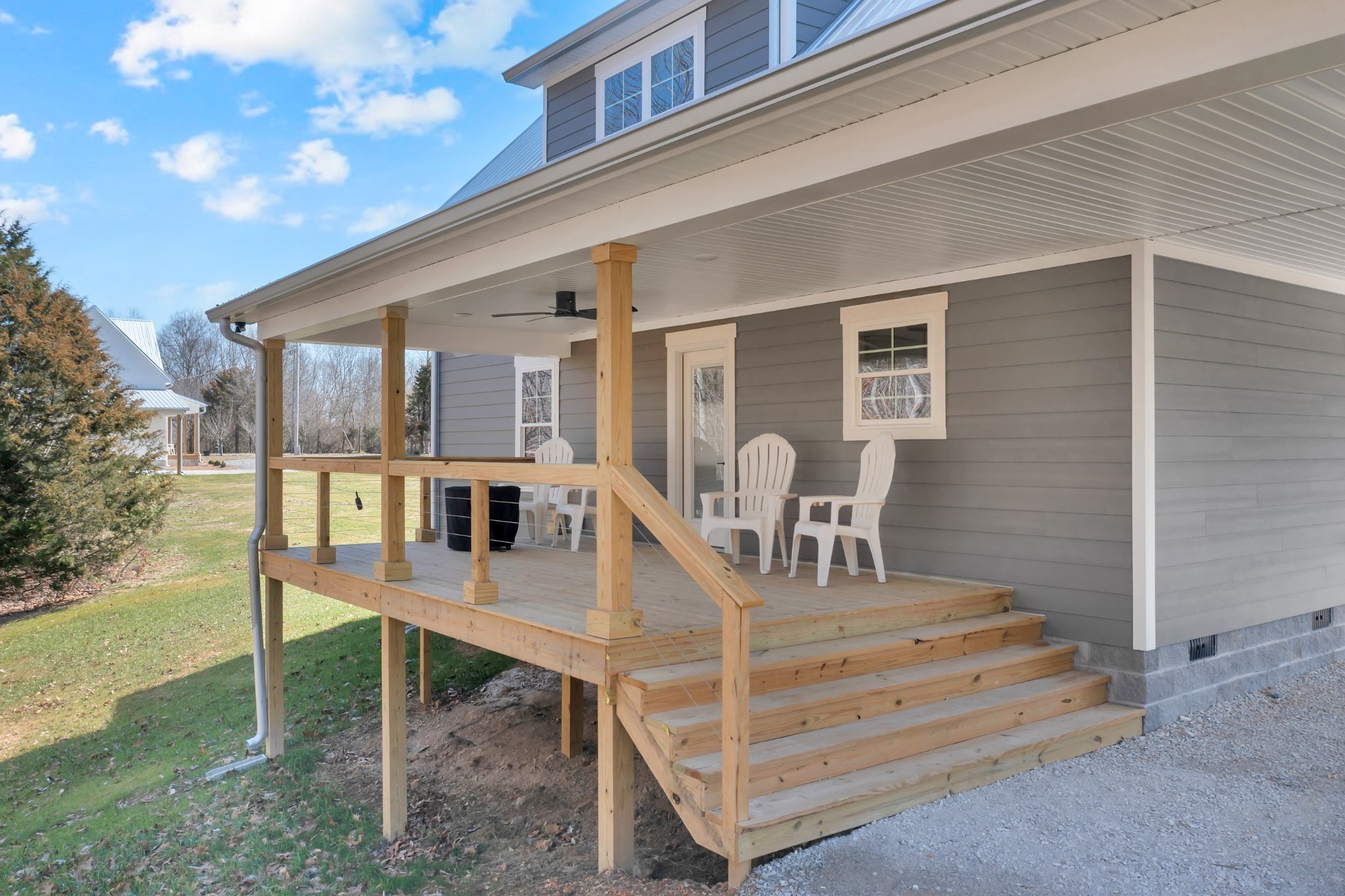 555 Ghea Road Normandy, TN 37360 - Photo 5 of 43 a view of house with deck and outdoor seating