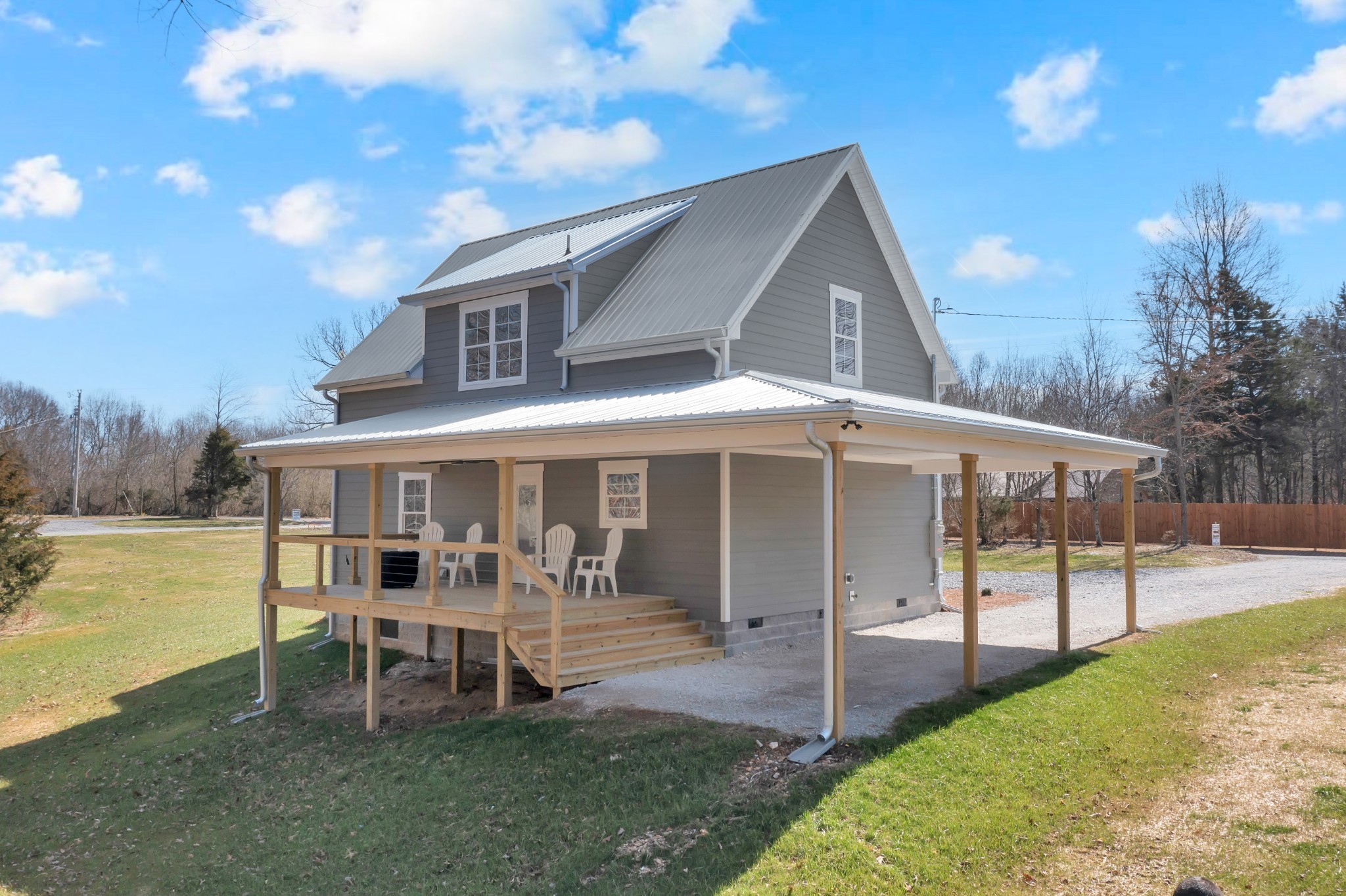 555 Ghea Road Normandy, TN 37360 - Photo 6 of 43 a view of a house with a yard and sitting area
