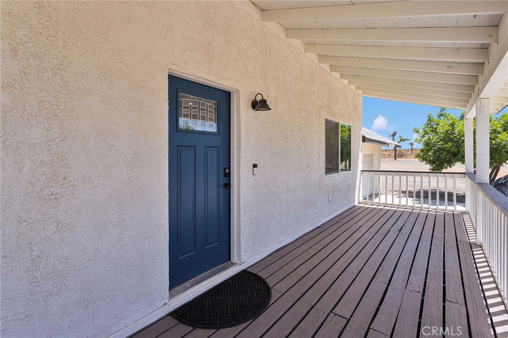 8038 Begonia Road Phelan, CA 92371 - Photo 6 of 49 a view of balcony with wooden floor