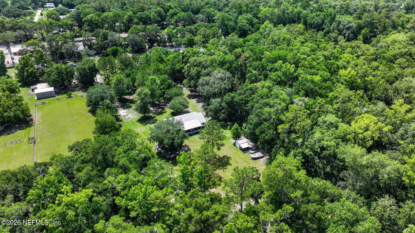 264 Peniel Church Road Palatka, FL 32177 - Photo 44 of 48 an aerial view of residential house with outdoor space and trees all around