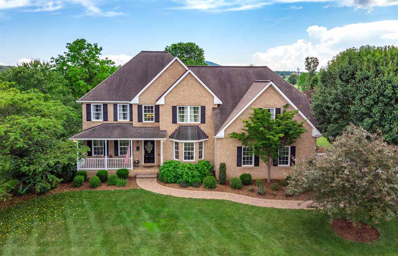 359 Patterson Mill Road Grottoes, VA 24441 - Photo 1 of 50 a front view of a house with a yard and green space