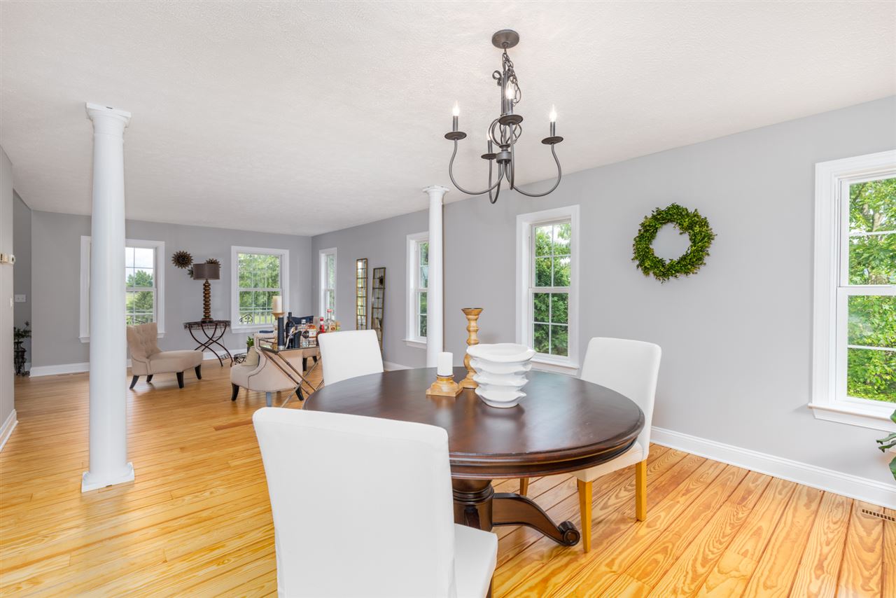 359 Patterson Mill Road Grottoes, VA 24441 - Photo 19 of 50 a view of a dining room with furniture window and wooden floor