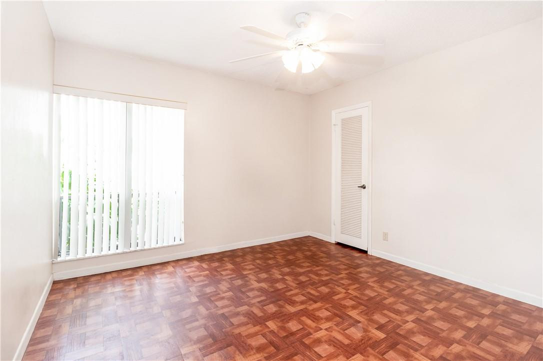 3992 North Pine Island Road, Unit 2A Sunrise, FL 33351 - Photo 13 of 18 an empty room with a window