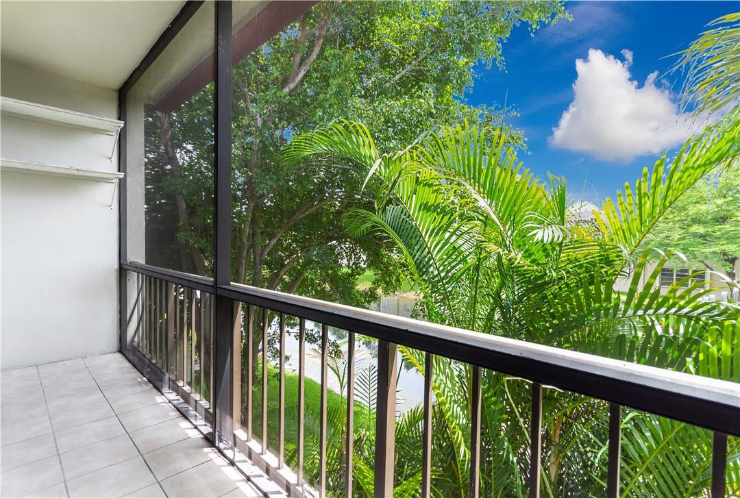 3992 North Pine Island Road, Unit 2A Sunrise, FL 33351 - Photo 15 of 18 a view of a balcony with a plant