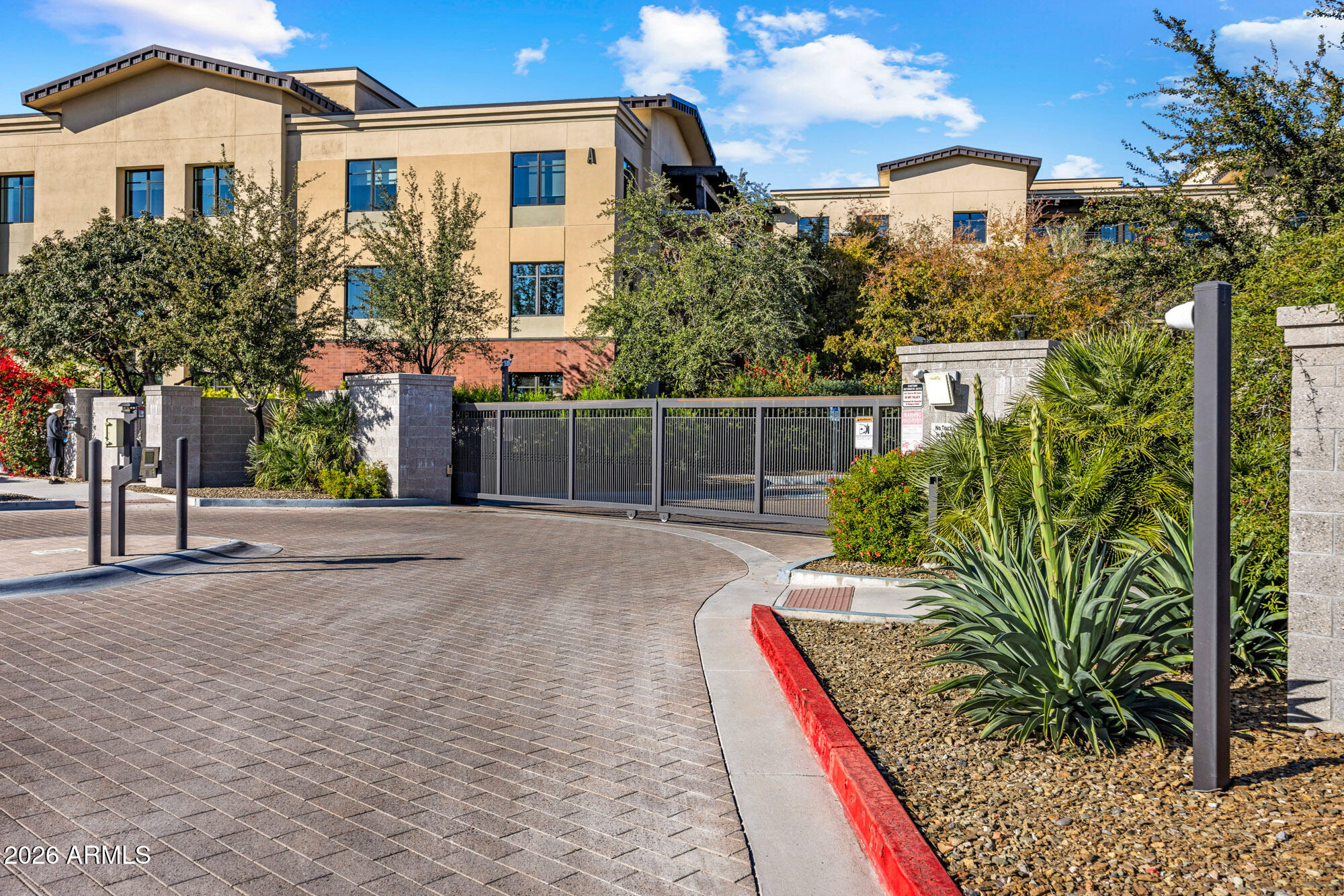 6166 North Scottsdale Road, Unit B1006 Paradise Valley, AZ 85253 - Photo 35 of 43 a house view with a outdoor space