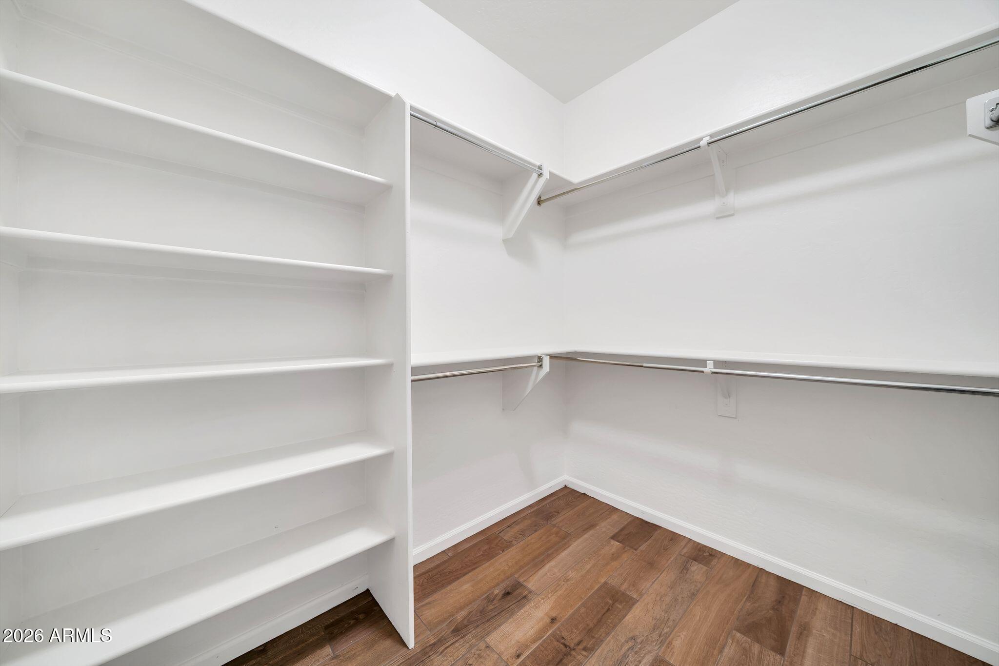 16435 West Berkeley Road Goodyear, AZ 85395 - Photo 26 of 52 a view of an empty walk in closet