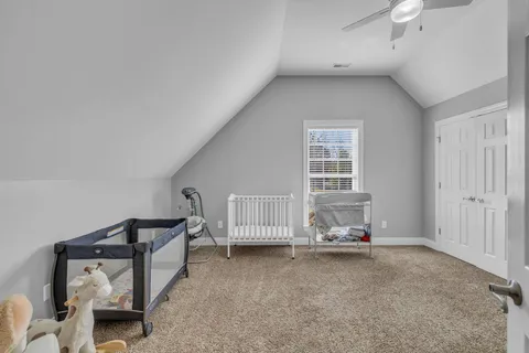 a view of livingroom with hardwood floor and a ceiling fan