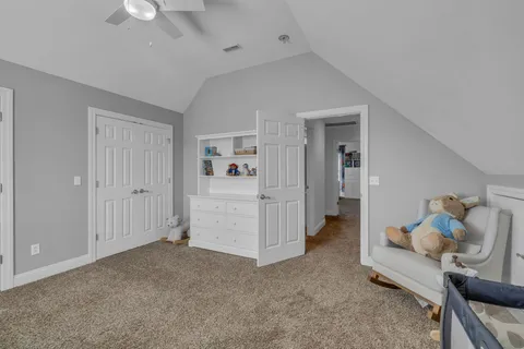 a bedroom with bed and window