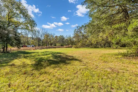 a house view with a outdoor space