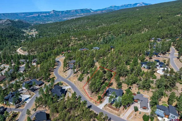 an aerial view of a city with lots of residential buildings