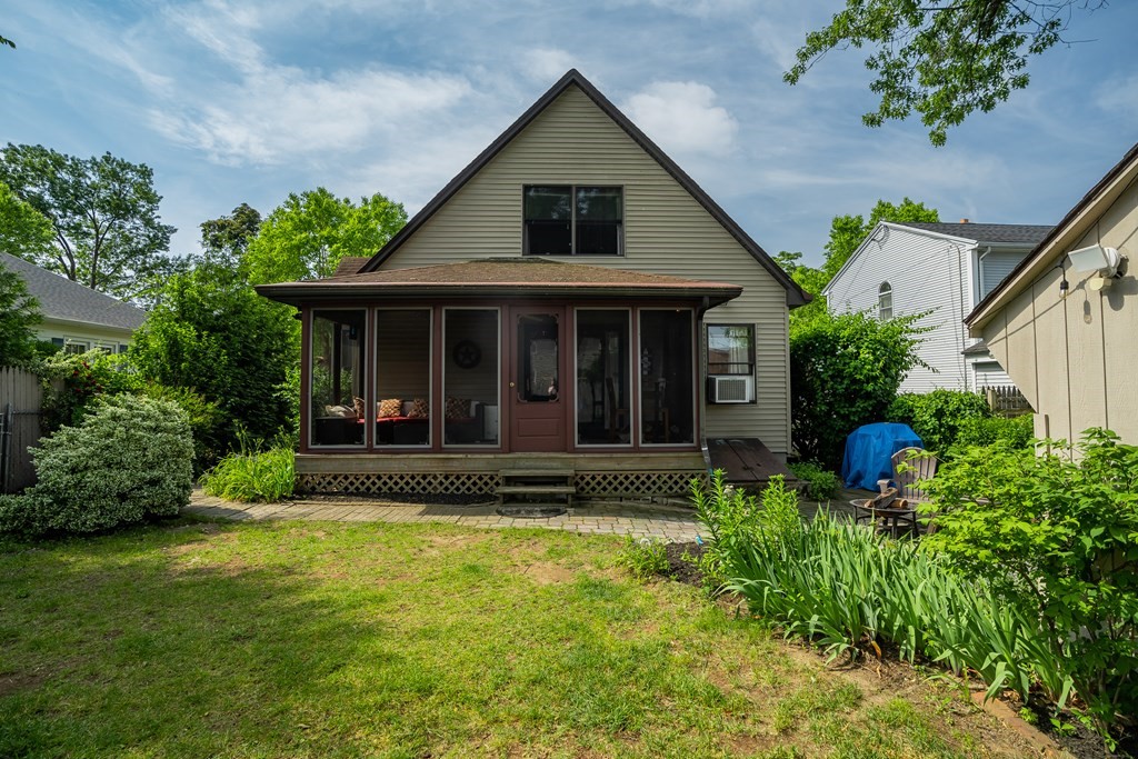 20 Rosella Street Springfield, MA 01118 - Photo 31 of 41 a view of a house with a yard and plants