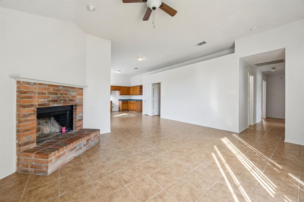 1602 Develon Drive Mesquite, TX 75149 - Photo 6 of 22 a view of livingroom with fireplace