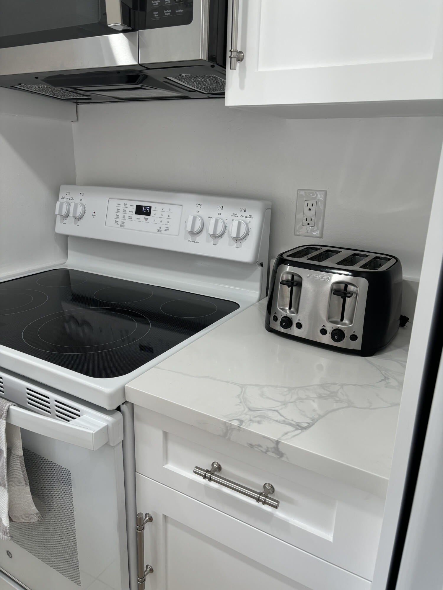 353 Highway 1, Unit A203 Jupiter, FL 33477 - Photo 19 of 26 a utility room with dryer and washer