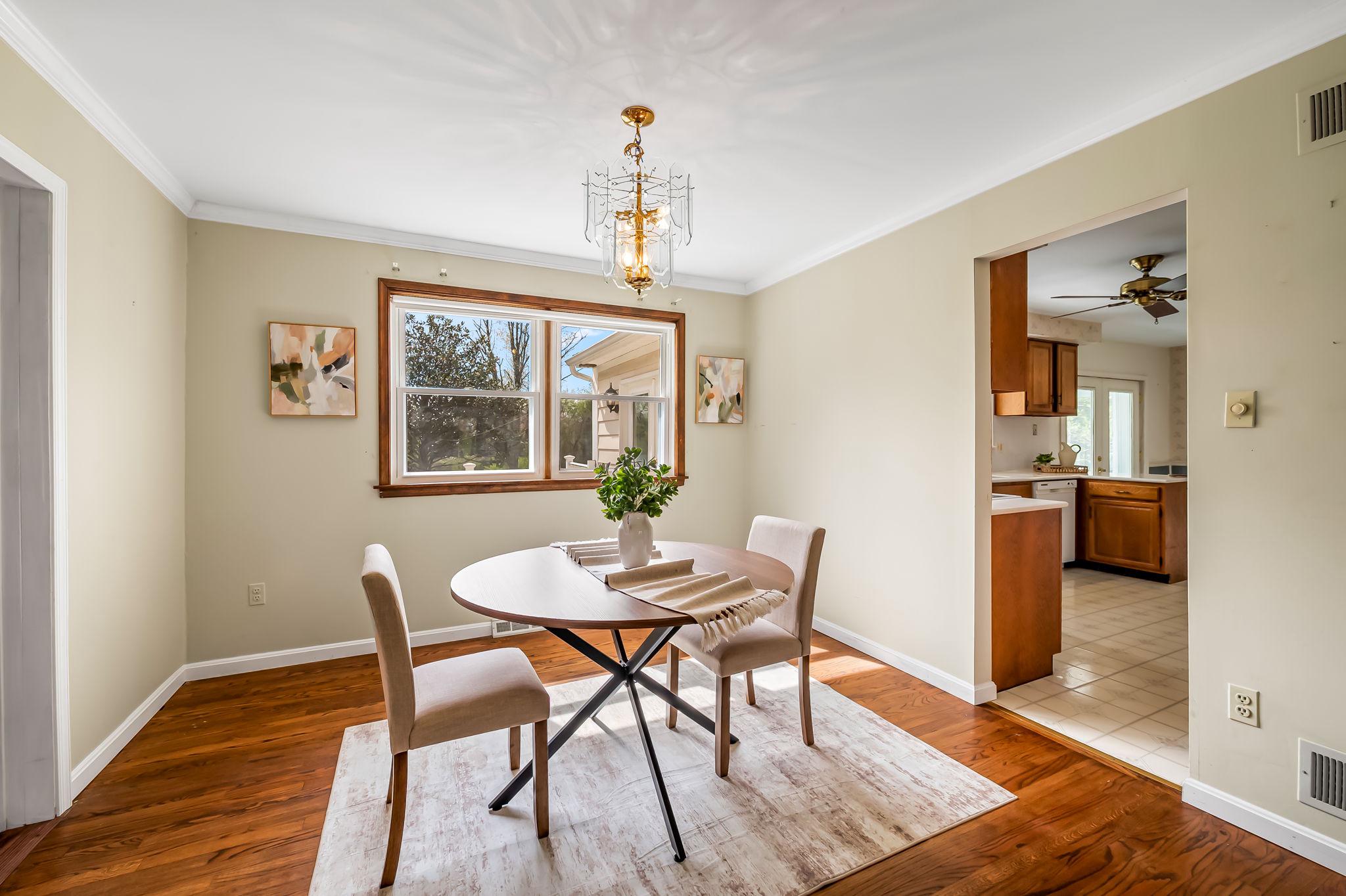 2619 Bradenbaugh Road White Hall, MD 21161 - Photo 12 of 50 a view of a dining room with furniture window and wooden floor