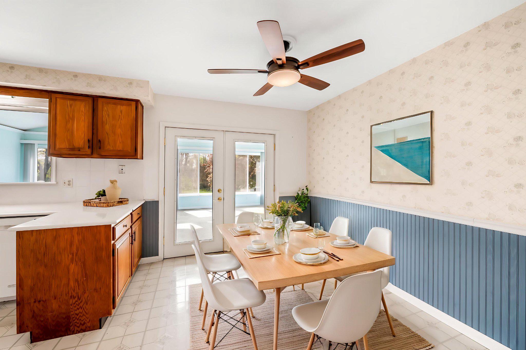 2619 Bradenbaugh Road White Hall, MD 21161 - Photo 17 of 50 a view of a dining room with furniture and a chandelier
