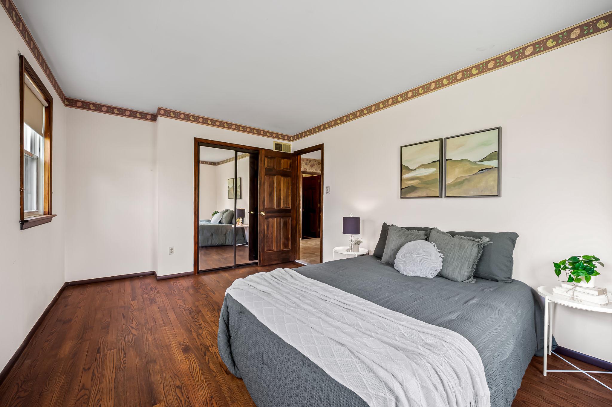 2619 Bradenbaugh Road White Hall, MD 21161 - Photo 22 of 50 a bedroom with a bed and a painting on the wall