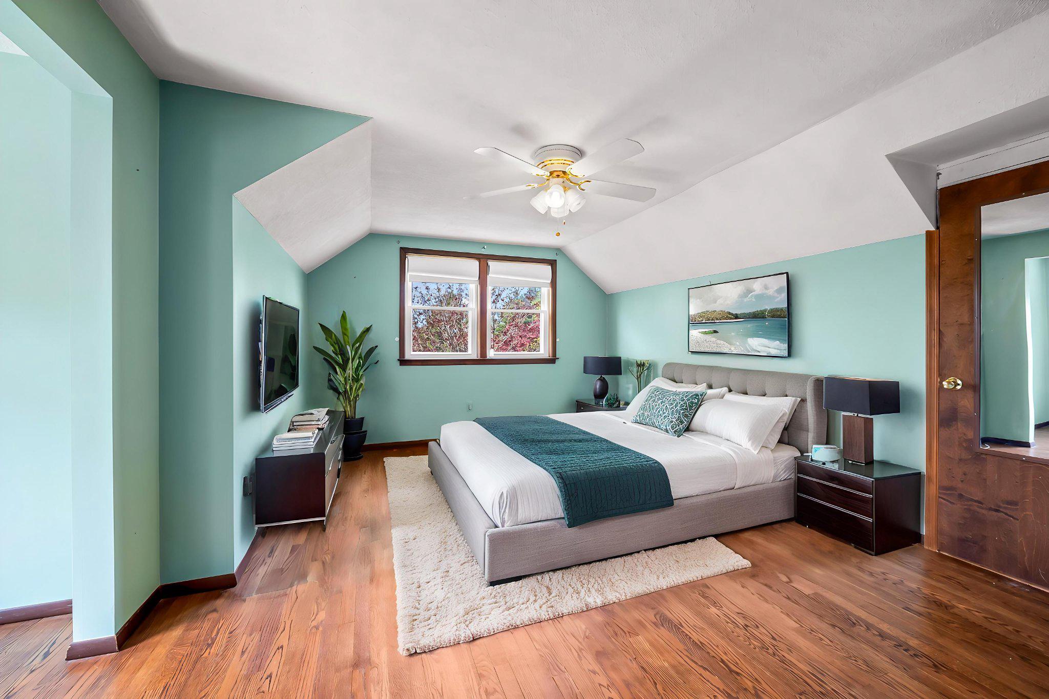 2619 Bradenbaugh Road White Hall, MD 21161 - Photo 27 of 50 a bedroom with a bed ceiling fan and a window