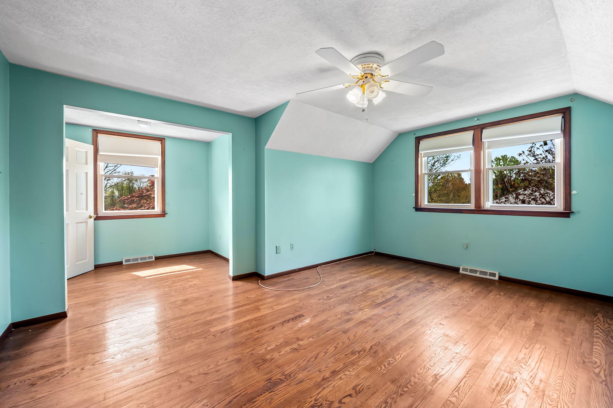 2619 Bradenbaugh Road White Hall, MD 21161 - Photo 28 of 50 a view of an empty room with wooden floor and a window