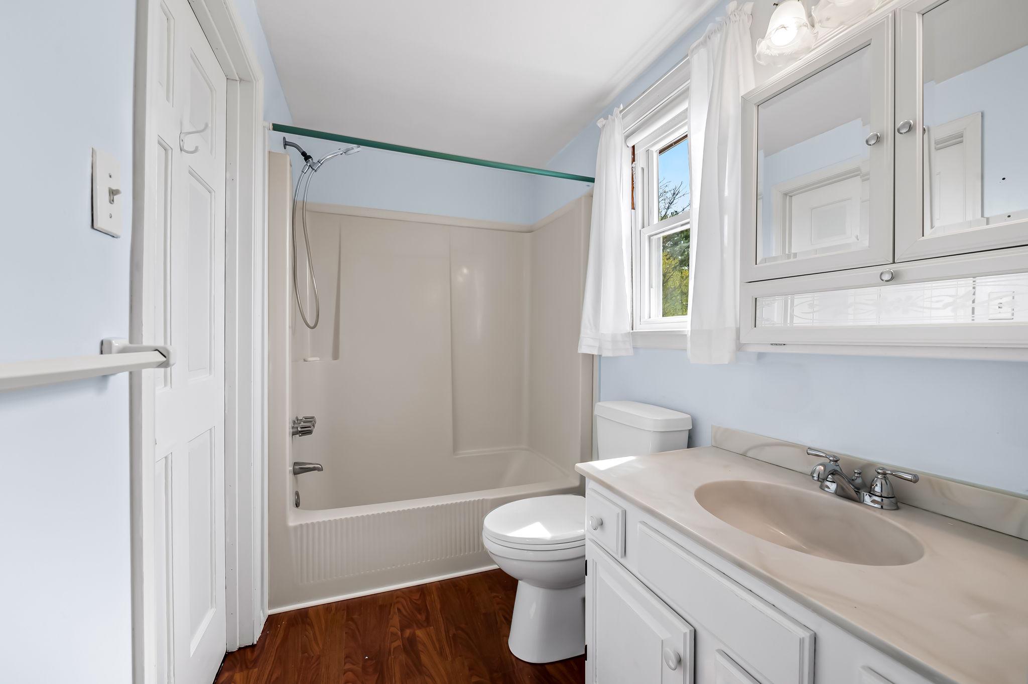 2619 Bradenbaugh Road White Hall, MD 21161 - Photo 30 of 50 a bathroom with a sink toilet tub and shower