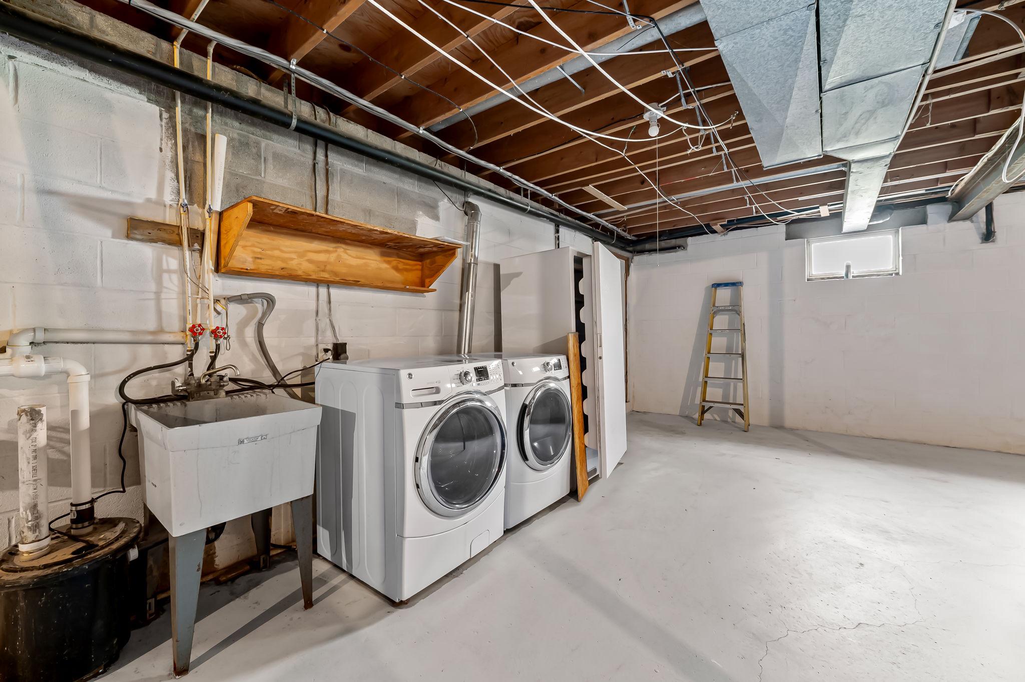 2619 Bradenbaugh Road White Hall, MD 21161 - Photo 36 of 50 a utility room with dryer and washer