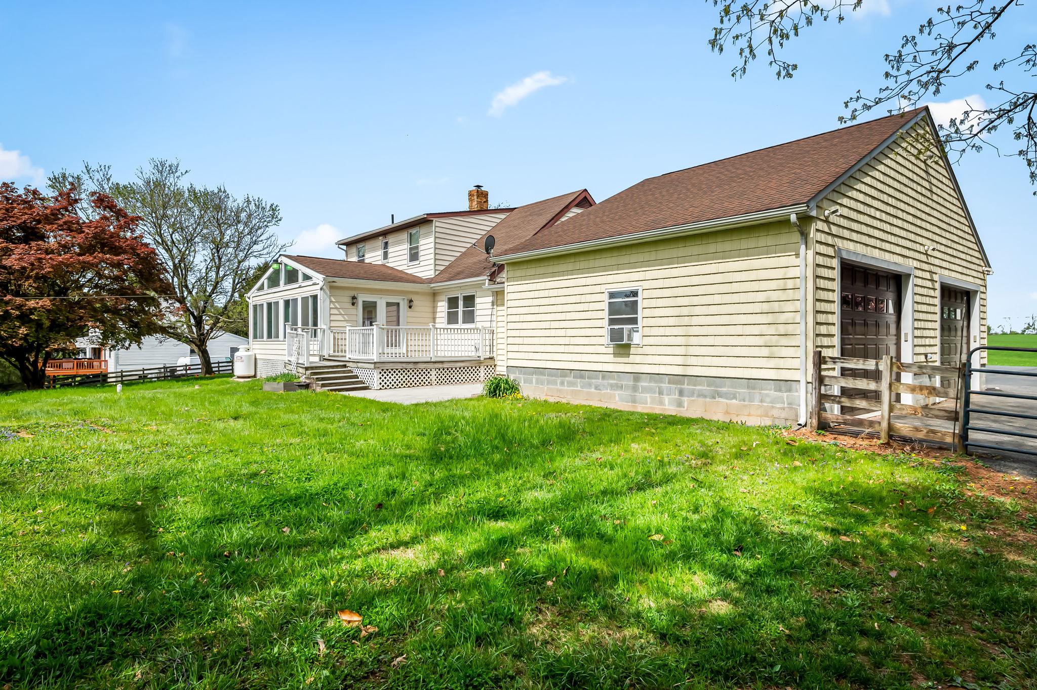 2619 Bradenbaugh Road White Hall, MD 21161 - Photo 41 of 50 a front view of a house with a garden