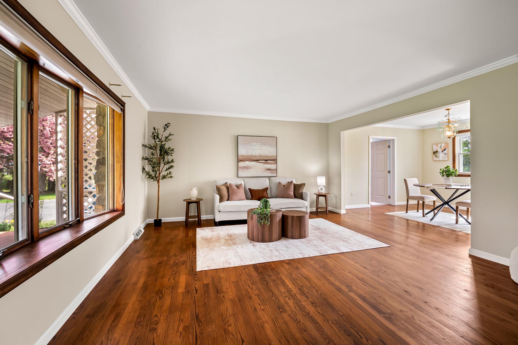 2619 Bradenbaugh Road White Hall, MD 21161 - Photo 9 of 50 a living room with furniture large window and wooden floor