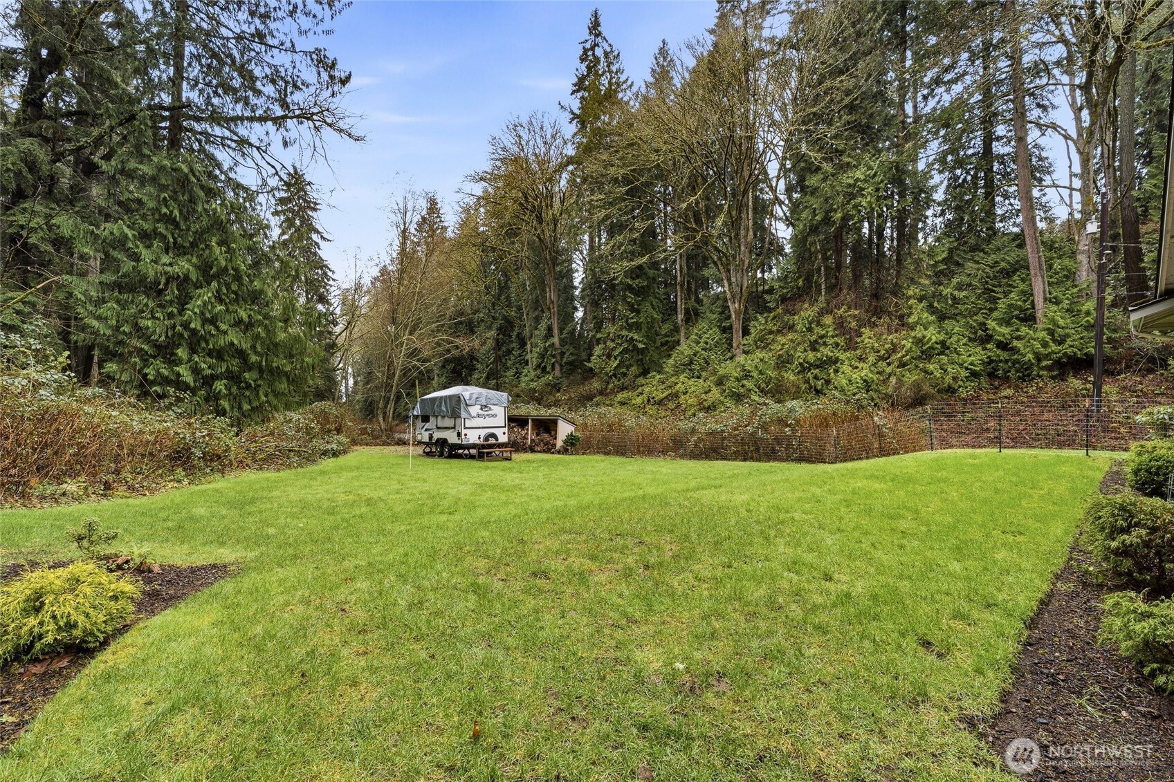 6830 Norma Beach Road Edmonds, WA 98026 - Photo 24 of 30 a front view of a house with a yard