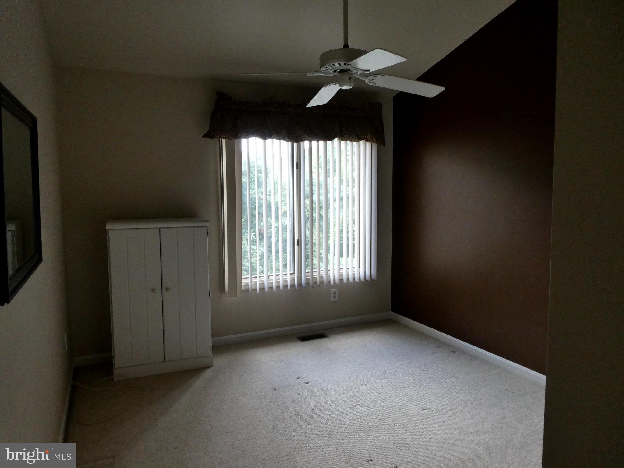 5147 Columbia Road, Unit 832 Columbia, MD 21044 - Photo 13 of 32 Rear Bedroom 2 with view to exterior treeline