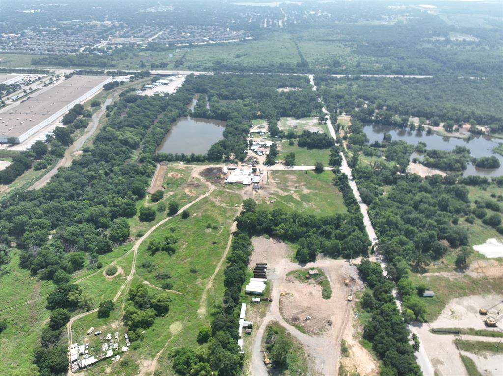 468 West Oakdale Road Grand Prairie, TX 75050 - Photo 7 of 10 an aerial view of residential houses with outdoor space