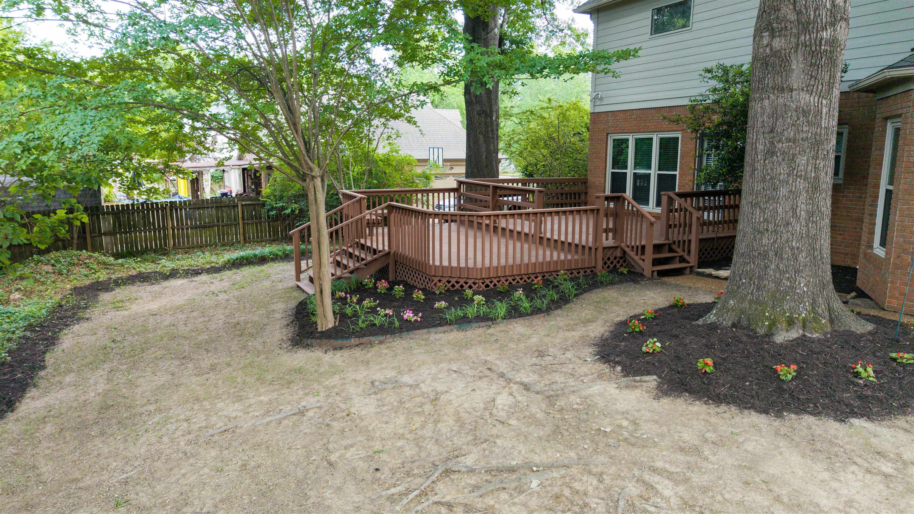 9190 East Bridge Drive Germantown, TN 38139 - Photo 32 of 37 Multi-level wood deck with integrated railings and lattice skirting