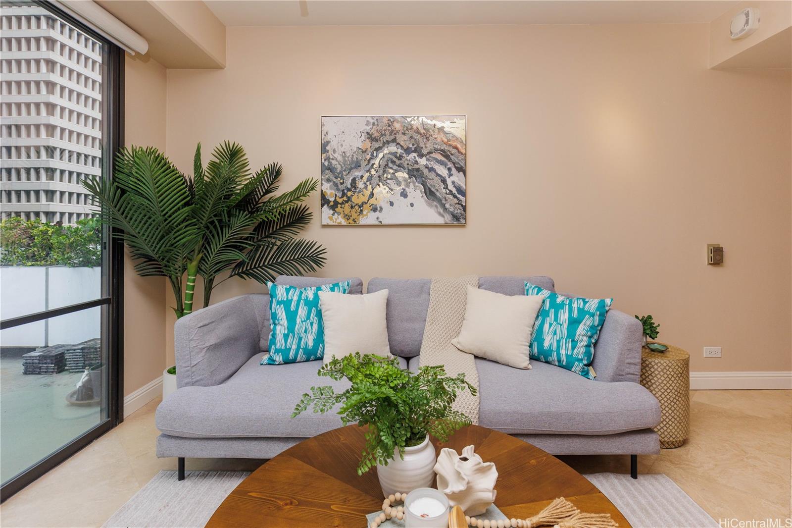225 Queen Street, Unit 7A Honolulu, HI 96813 - Photo 2 of 18 a living room with furniture flowerpot and a potted plant