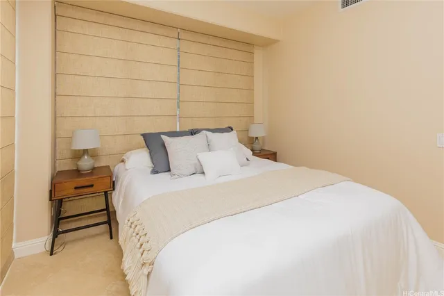 a bedroom with a bed and a shower