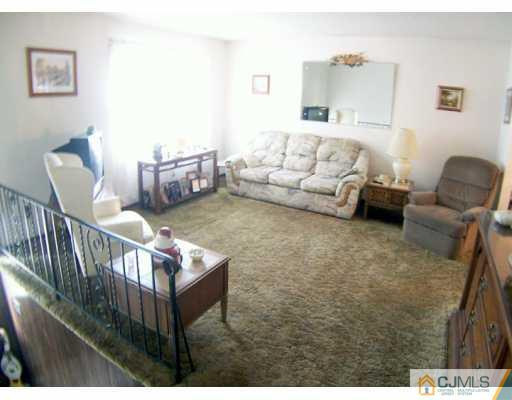 36 Maiden Way Colonia, NJ 07067 - Photo 2 of 8 a living room with furniture
