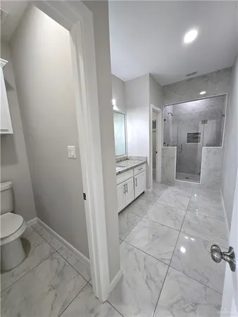 a bathroom with a sink and mirror