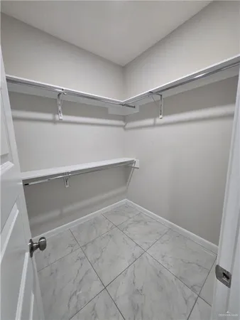 a view of a room with racks on the wall