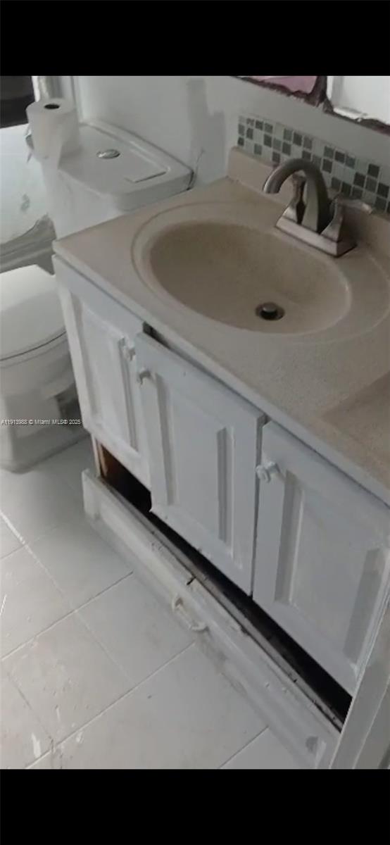 Golden Glades Miami, FL 33161 - Photo 13 of 18 a close view of sink and tap