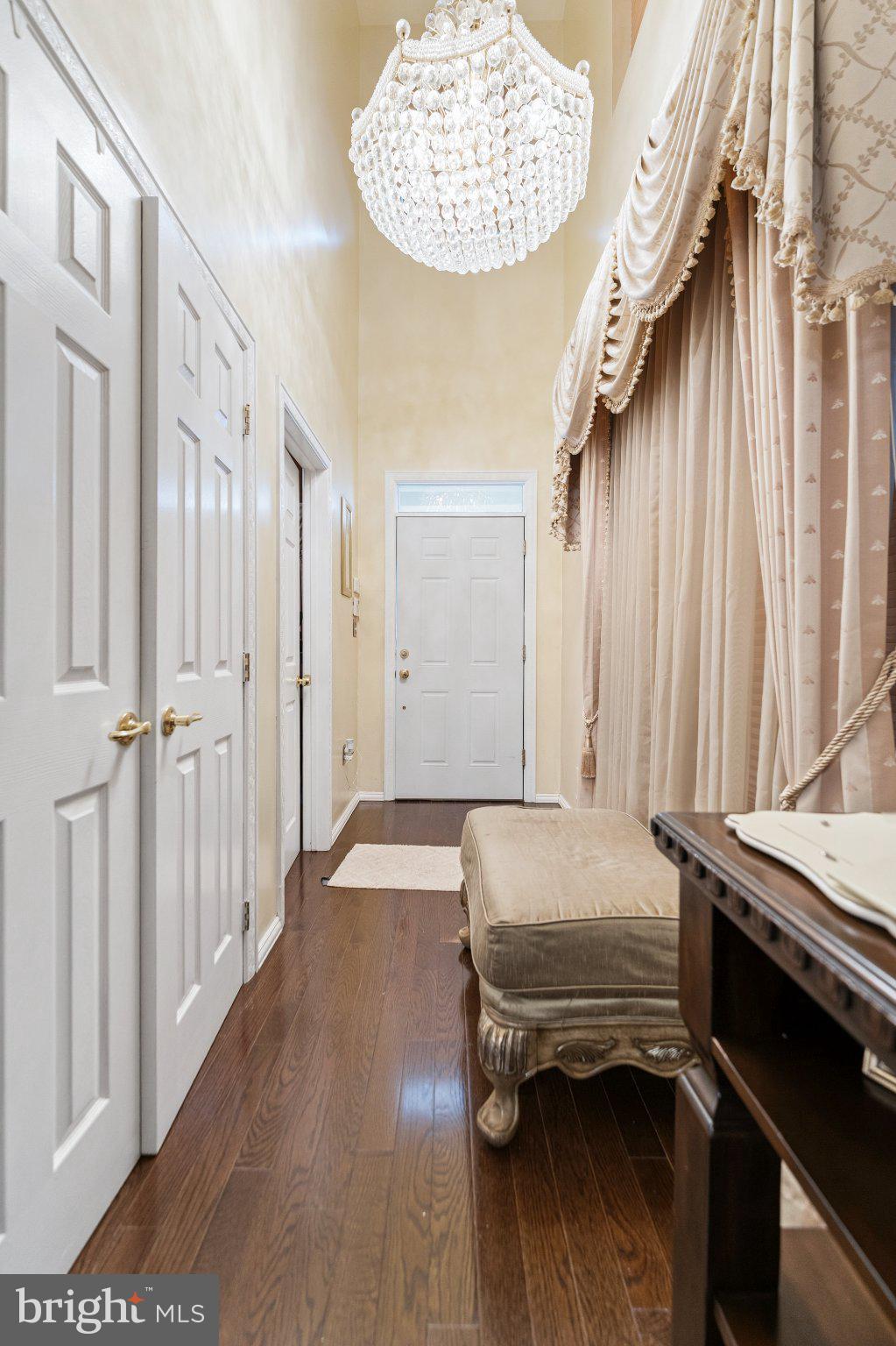 7 Spring Drive Dayton, NJ 08810 - Photo 3 of 24 Elegant foyer with a grand chandelier.