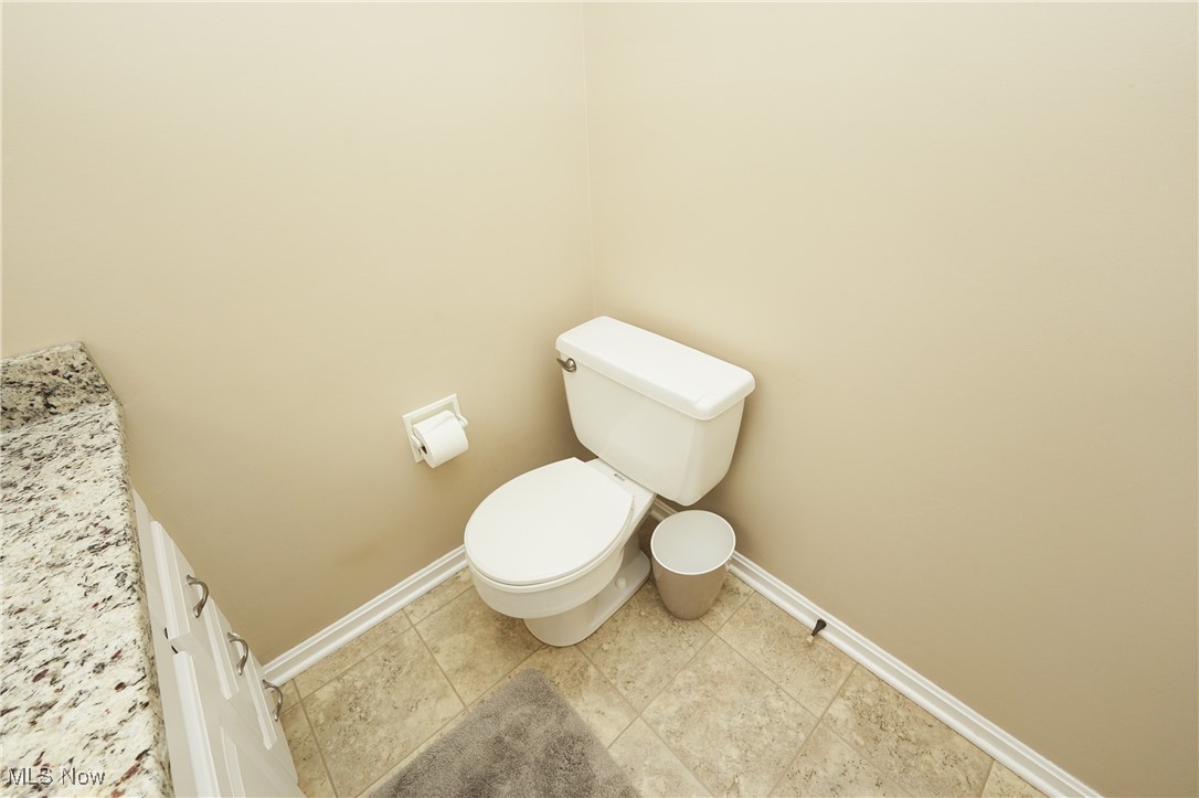 817 Rickel Circle Akron, OH 44333 - Photo 20 of 49 Bathroom featuring baseboards and toilet