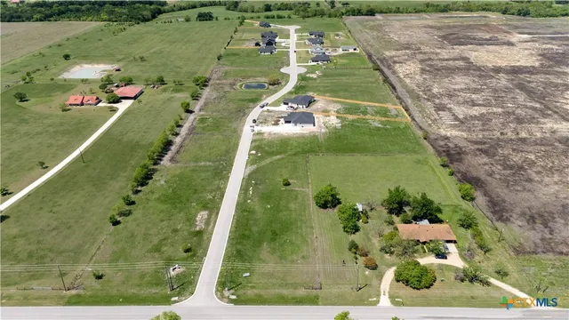 an aerial view of a residential houses