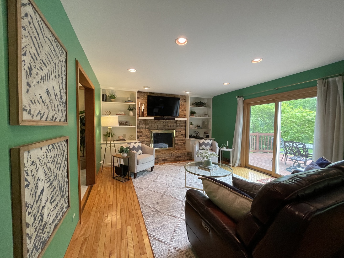 2006 Dorset Drive Wheaton, IL 60189 - Photo 8 of 10 a living room with furniture a fireplace and a flat screen tv