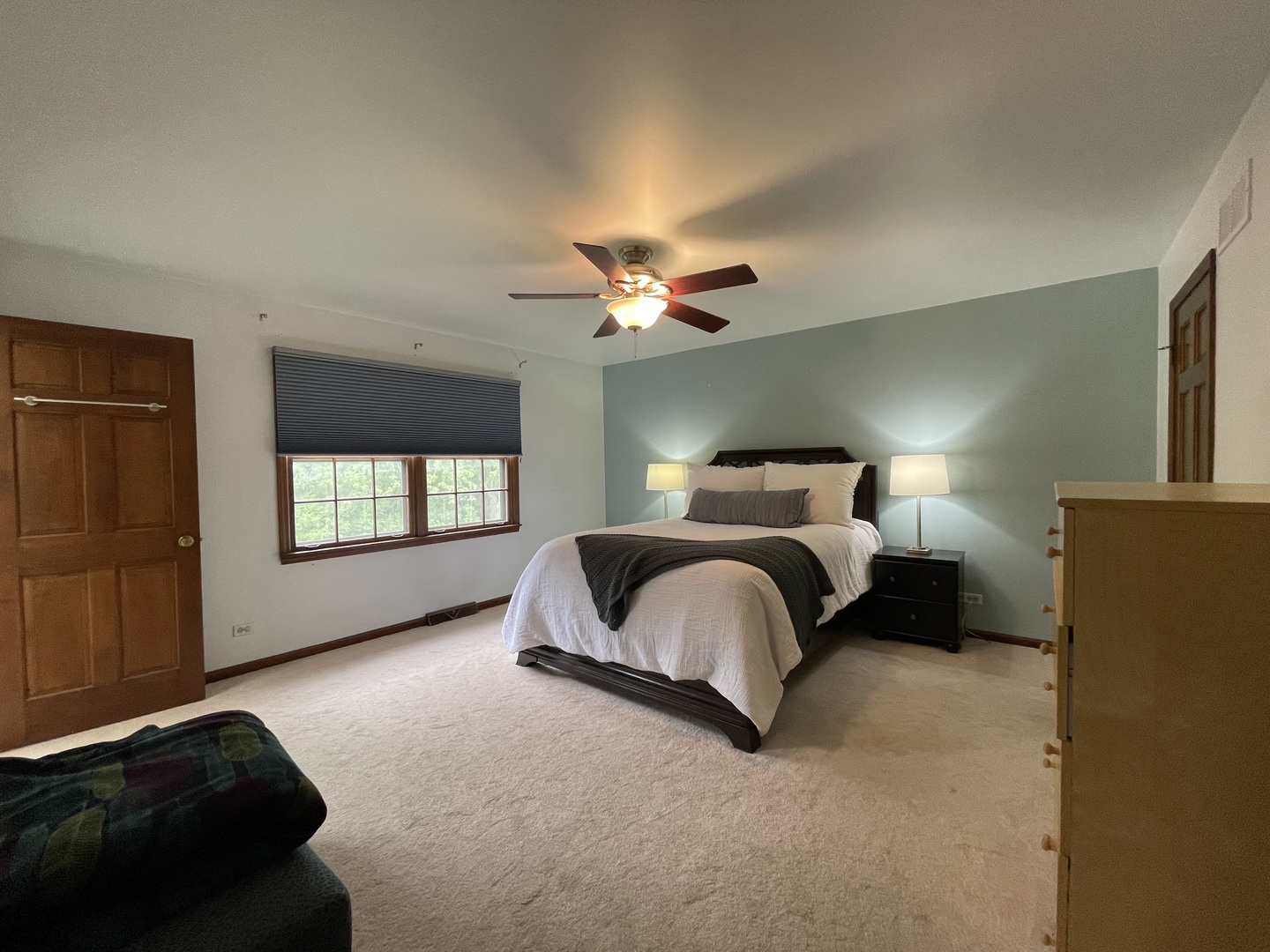 2006 Dorset Drive Wheaton, IL 60189 - Photo 10 of 10 a spacious bedroom with a bed and a ceiling fan